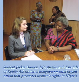 Student Jackie Humen, left, speaks with Ene Ede of Equity Advocates, a nongovernmental organization that promotes women's rights in Nigeria.